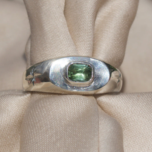 spring green tourmaline gemstone in chunky sterling silver ring, hand engraved stars